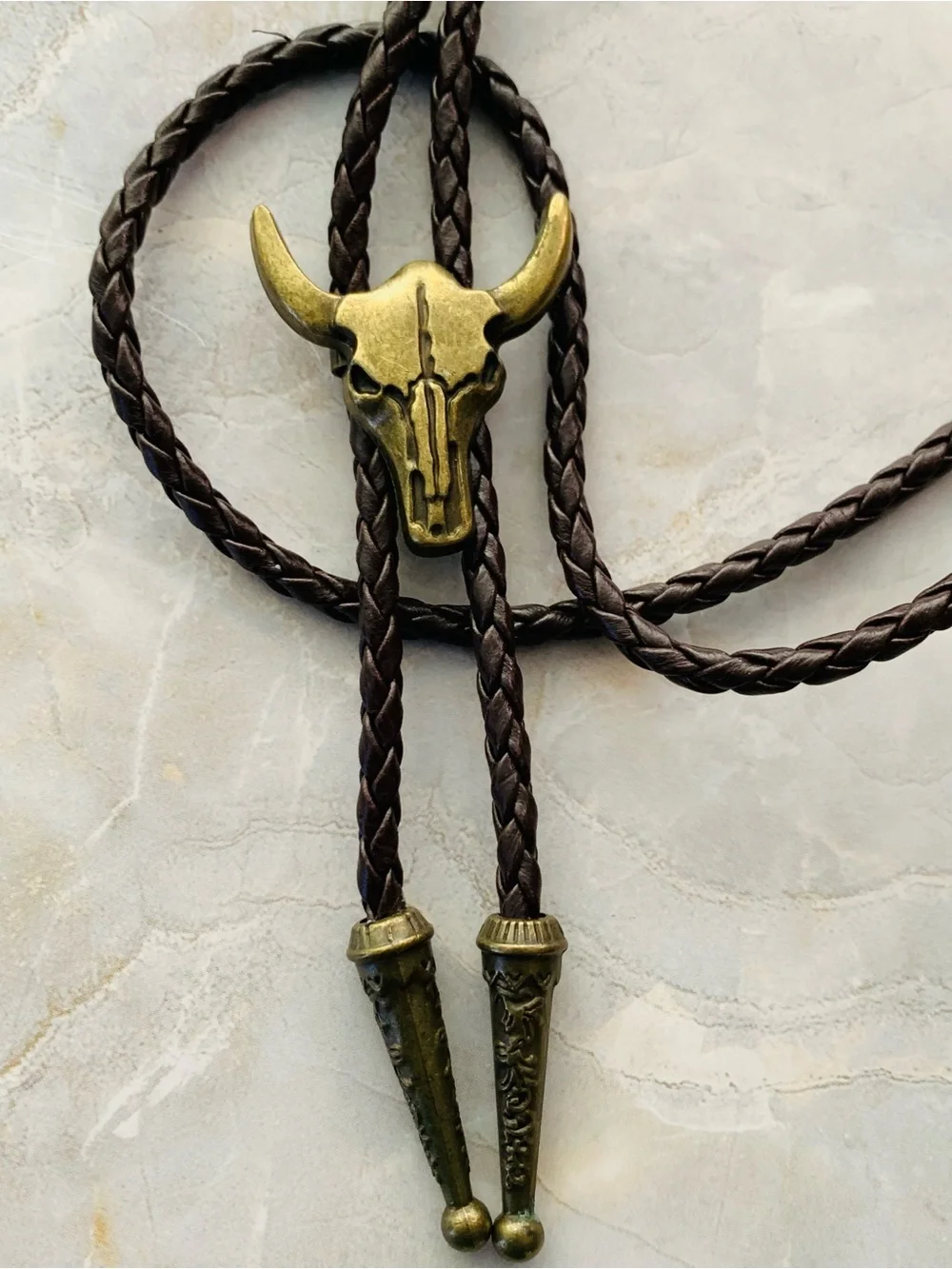 Western Bull Skull Bolo Tie in Brown Leather and Antique Brass